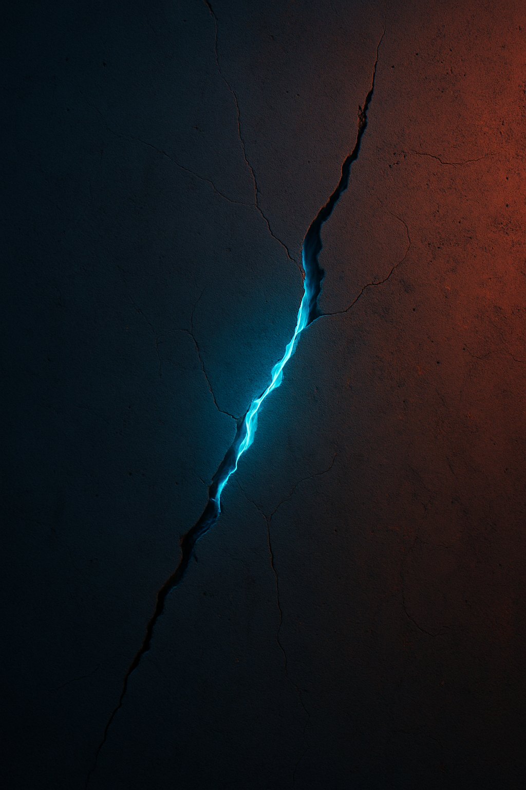 A cracked concrete wall with a glowing blue light shining through the split. Abst...