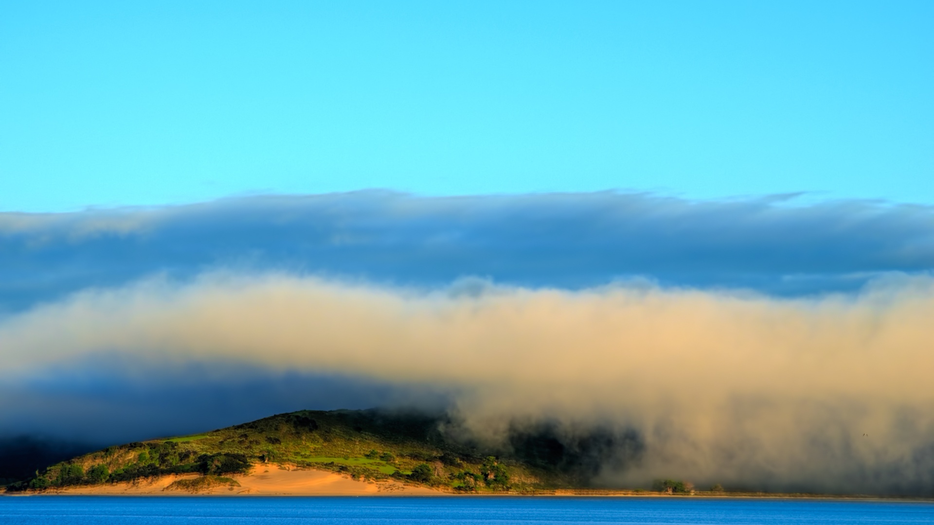 morning mist at dawn small boat going by