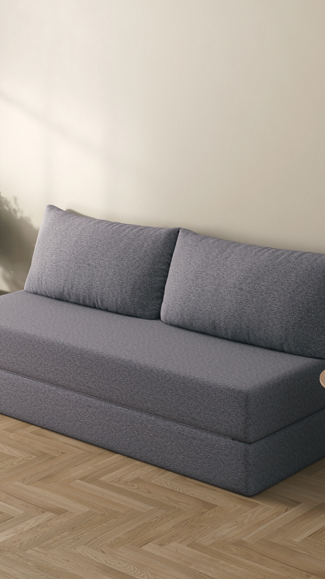 A realistic, cinematic animation of a sofa assembling itself from millions of tiny floating down ...