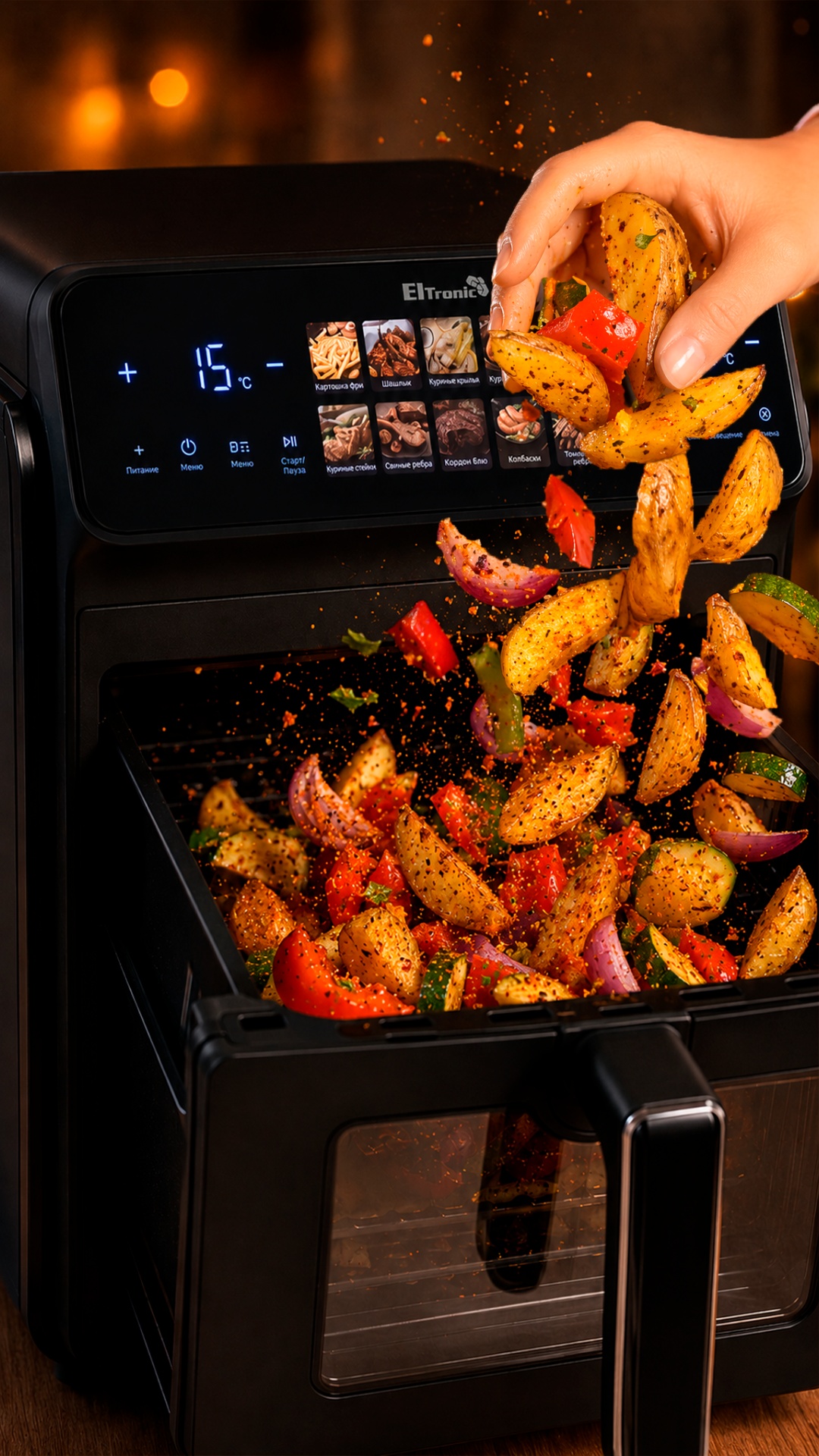 Slow-motion food commercial shot.

Potato wedges and vegetables fall into the upper drawer.

...