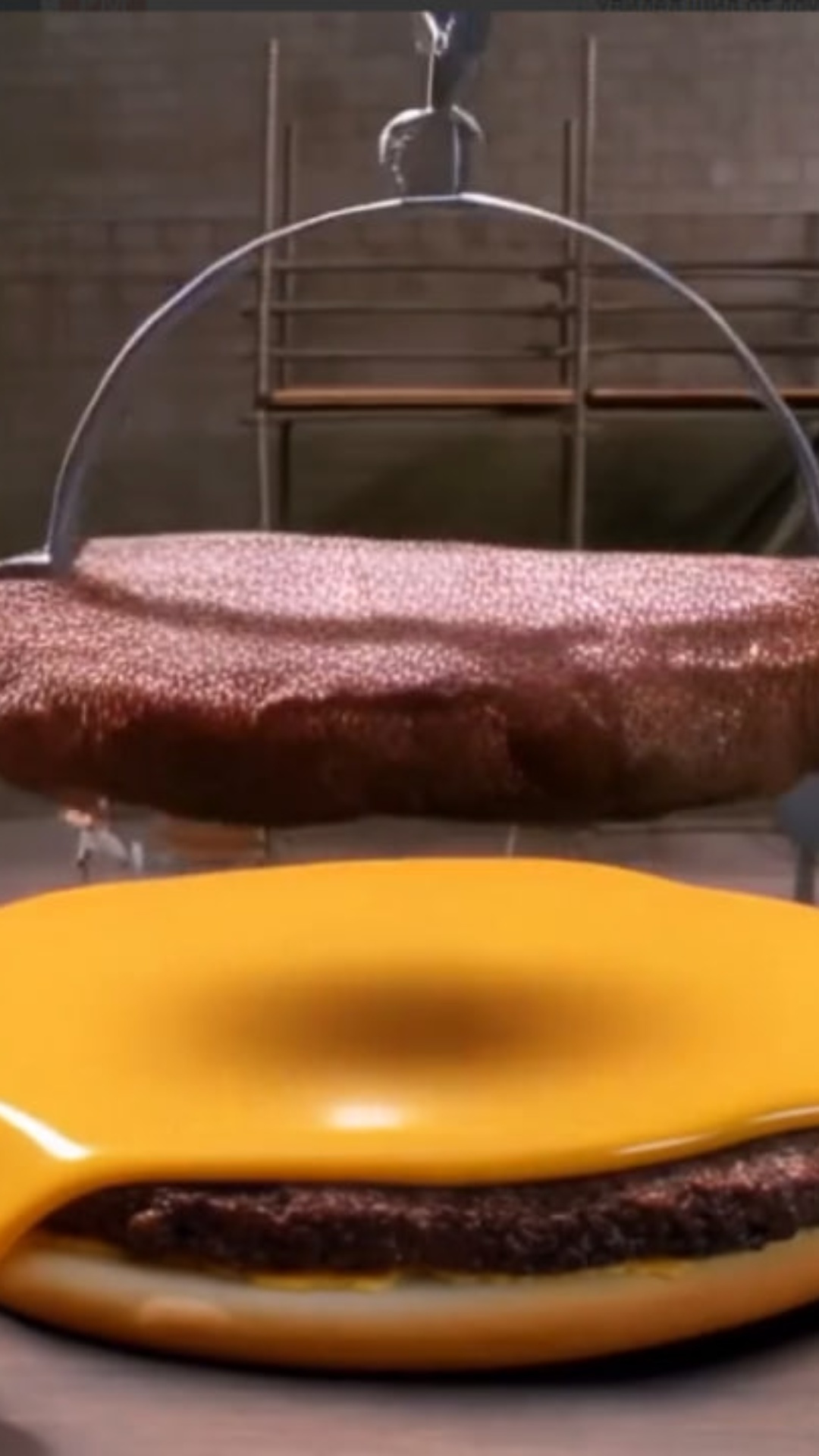Main Action: Tiny chefs and construction workers assemble a massive cheeseburger like an industri...