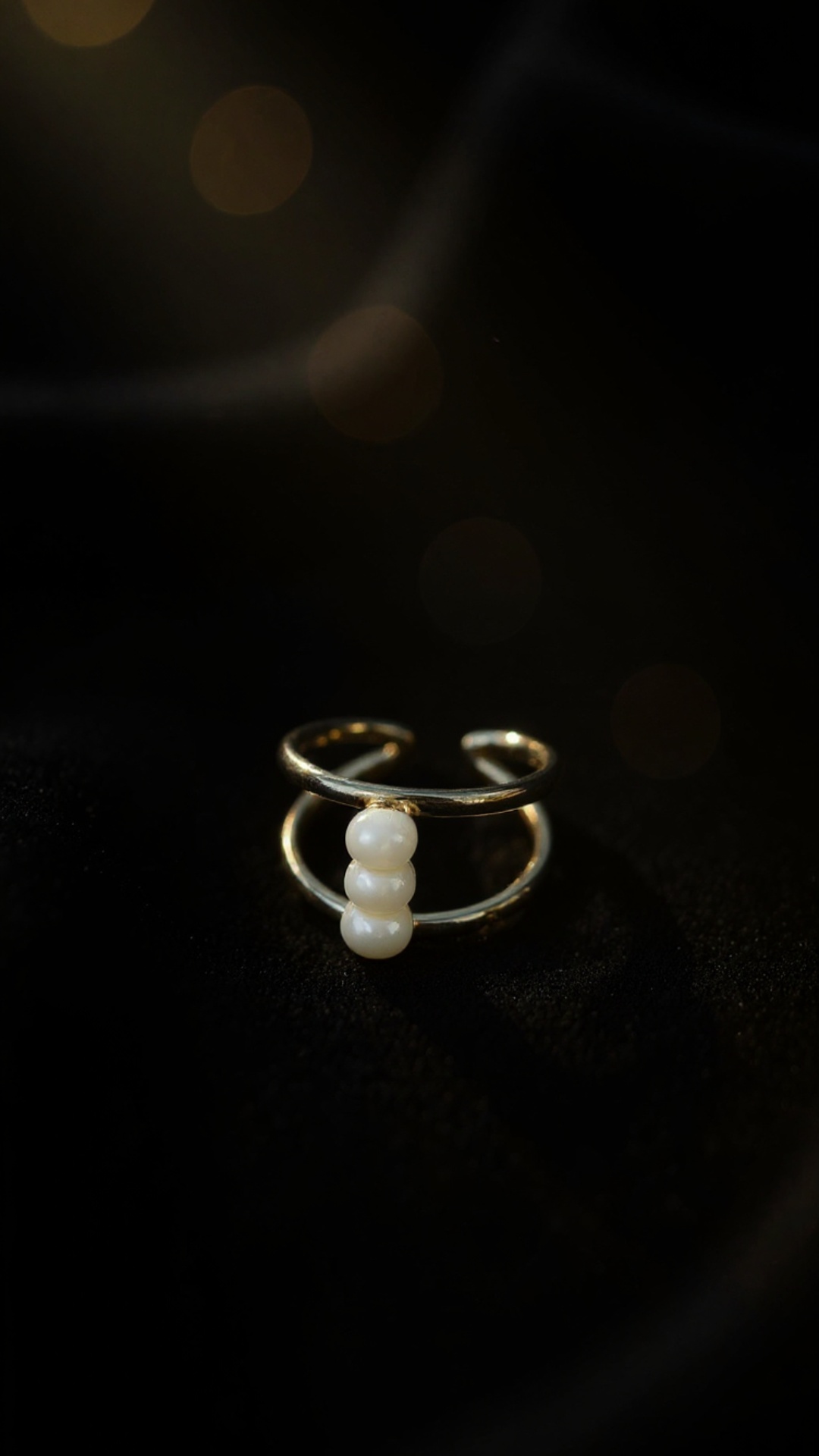 Macro shot of the ring in extreme close-up. Camera slowly rotates 360 degrees around the ring at ...