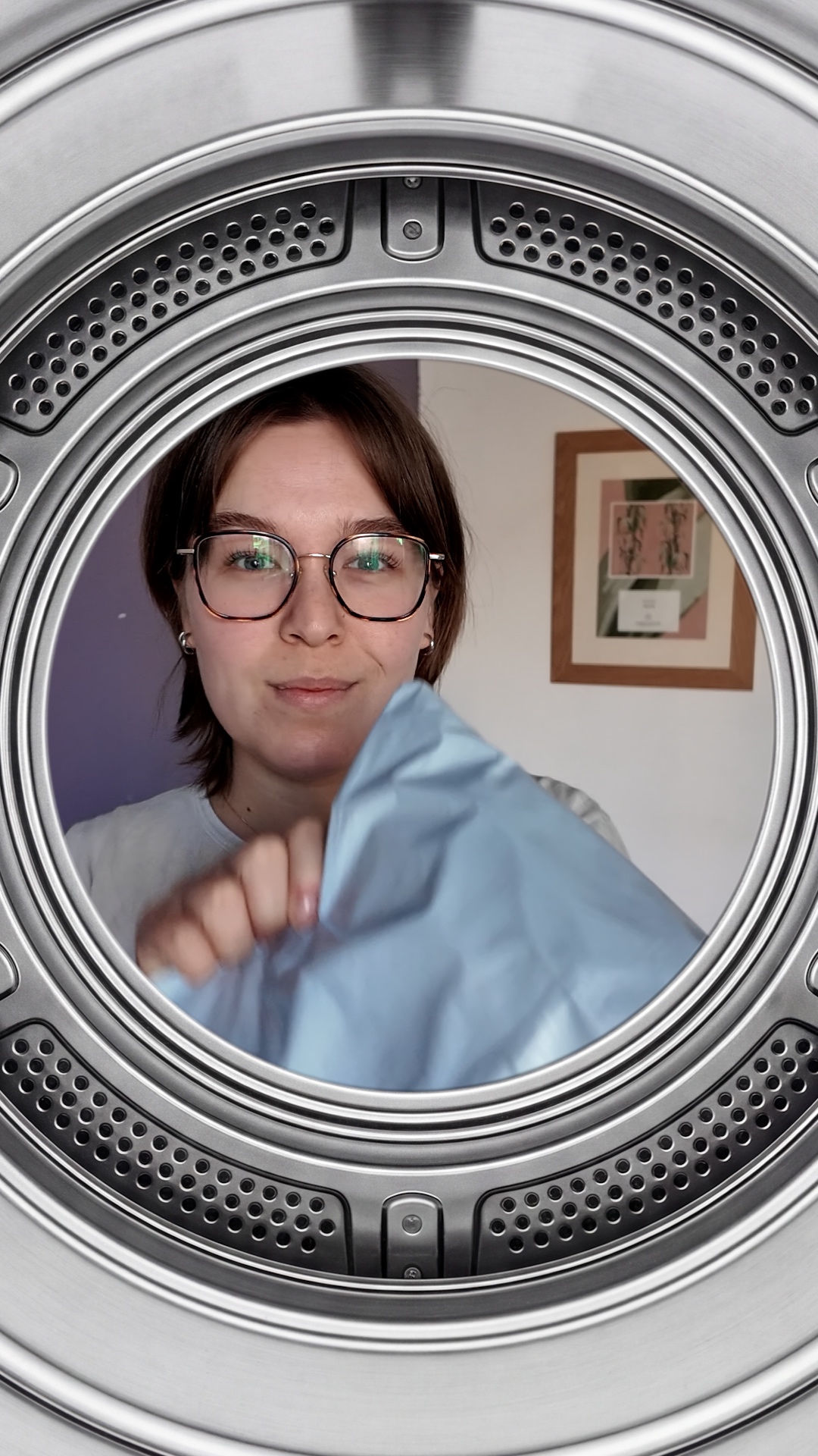Animate the original image with absolute identity preservation.
The person's face must remain exa...