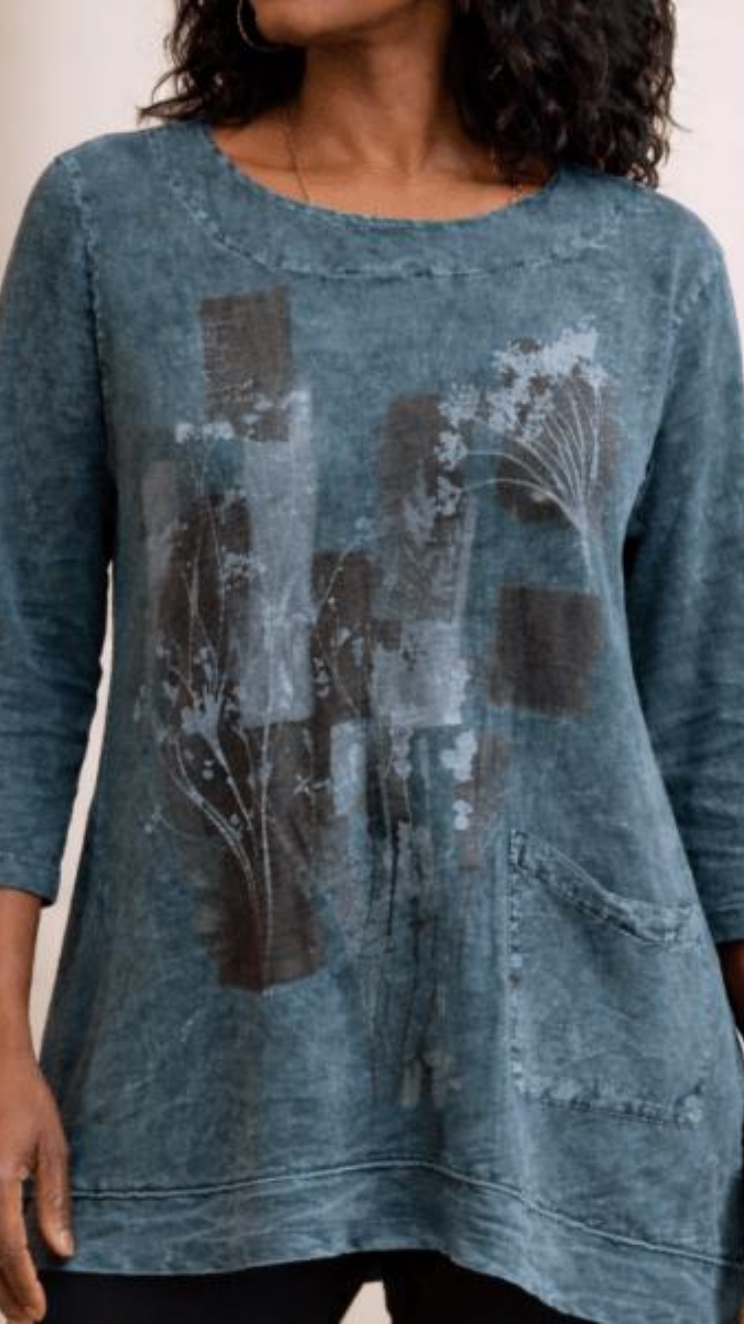 change bottom of hem to be frayed raw edge. Put her hand on each hip and show off shirt