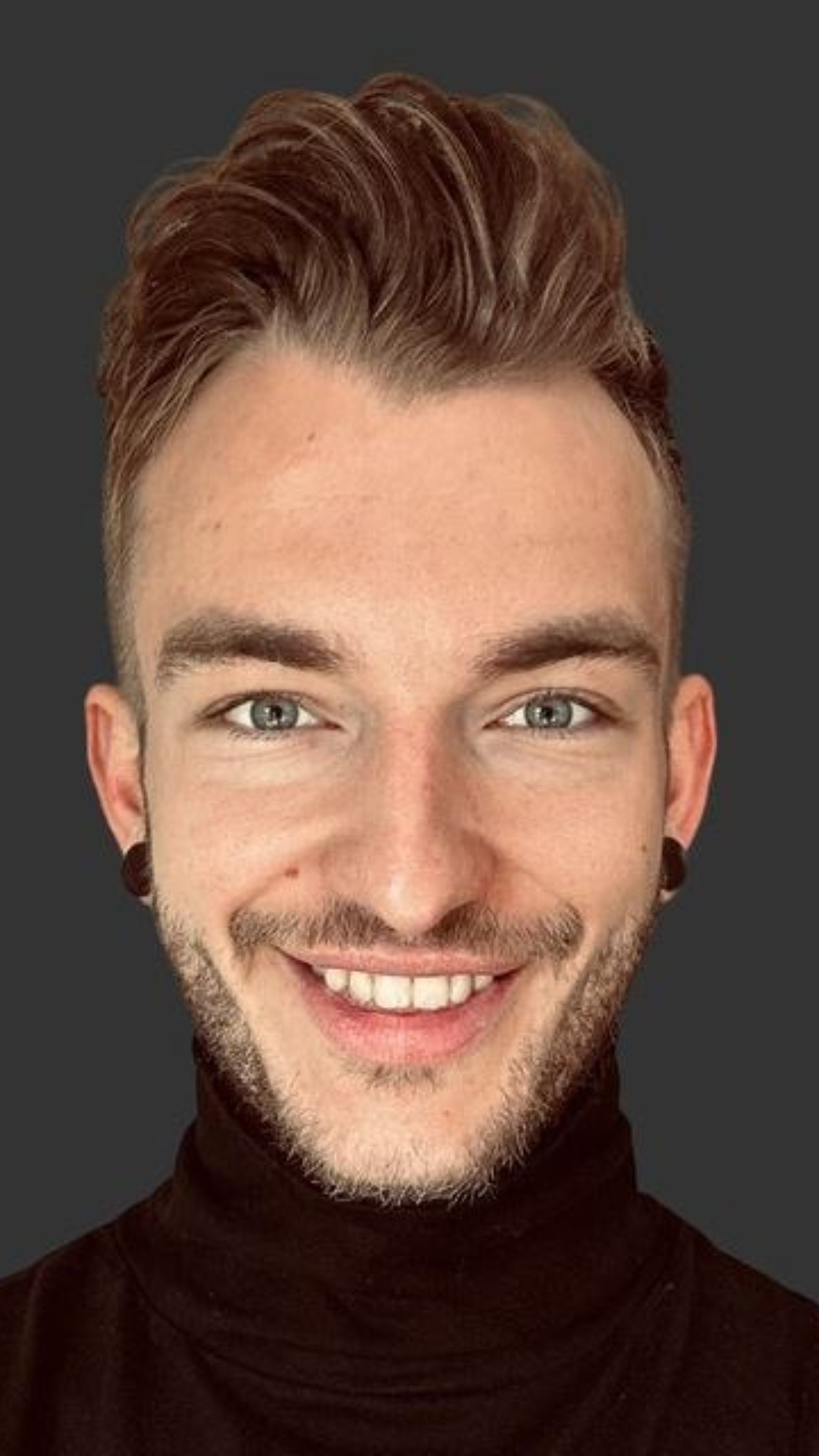 Animate this person very naturally with only subtle blinking, breathing, tiny eye movement, and m...
