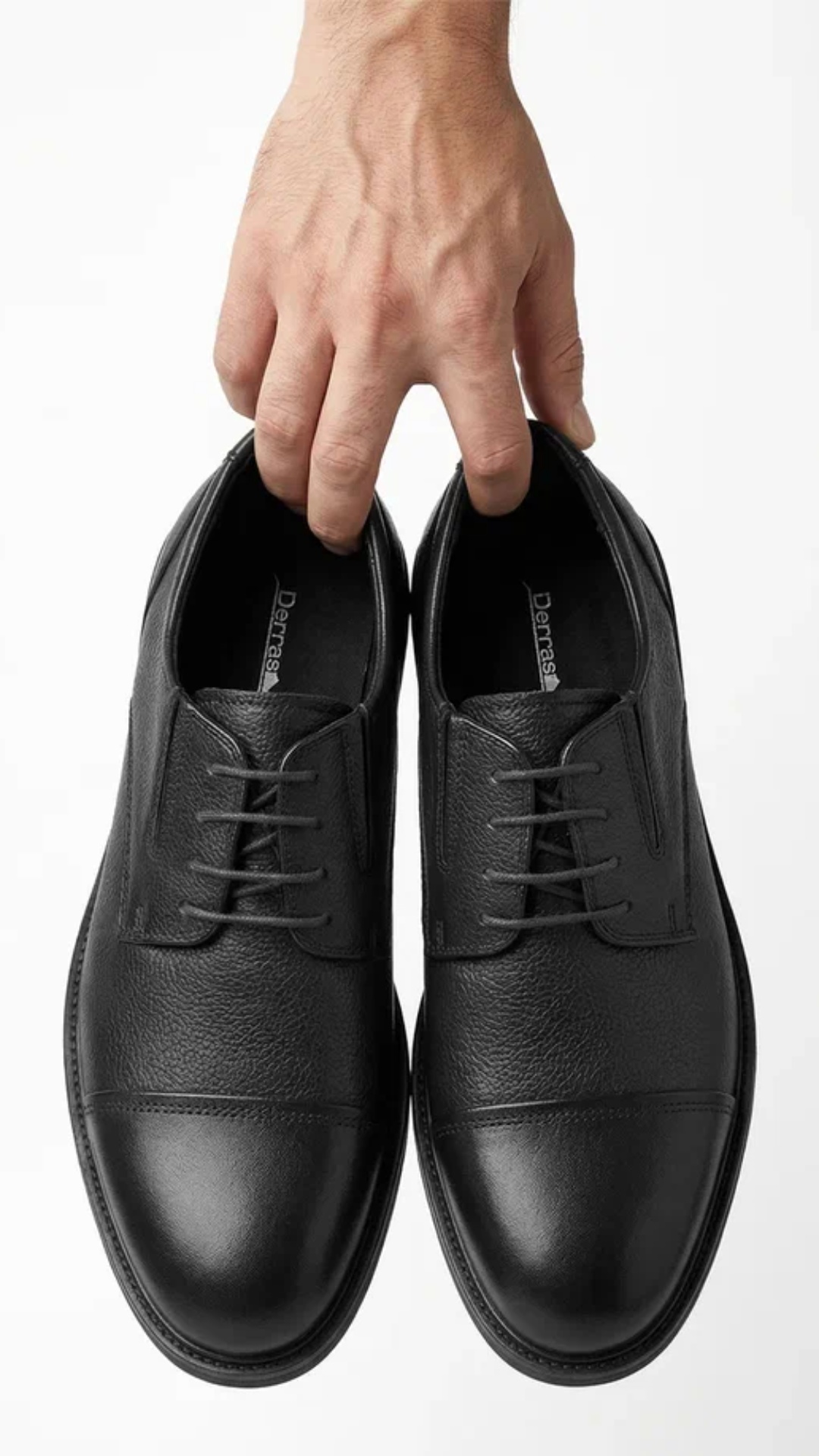Confident walk of a man wearing black derby shoes in minimal urban environment, smooth motion, ci...