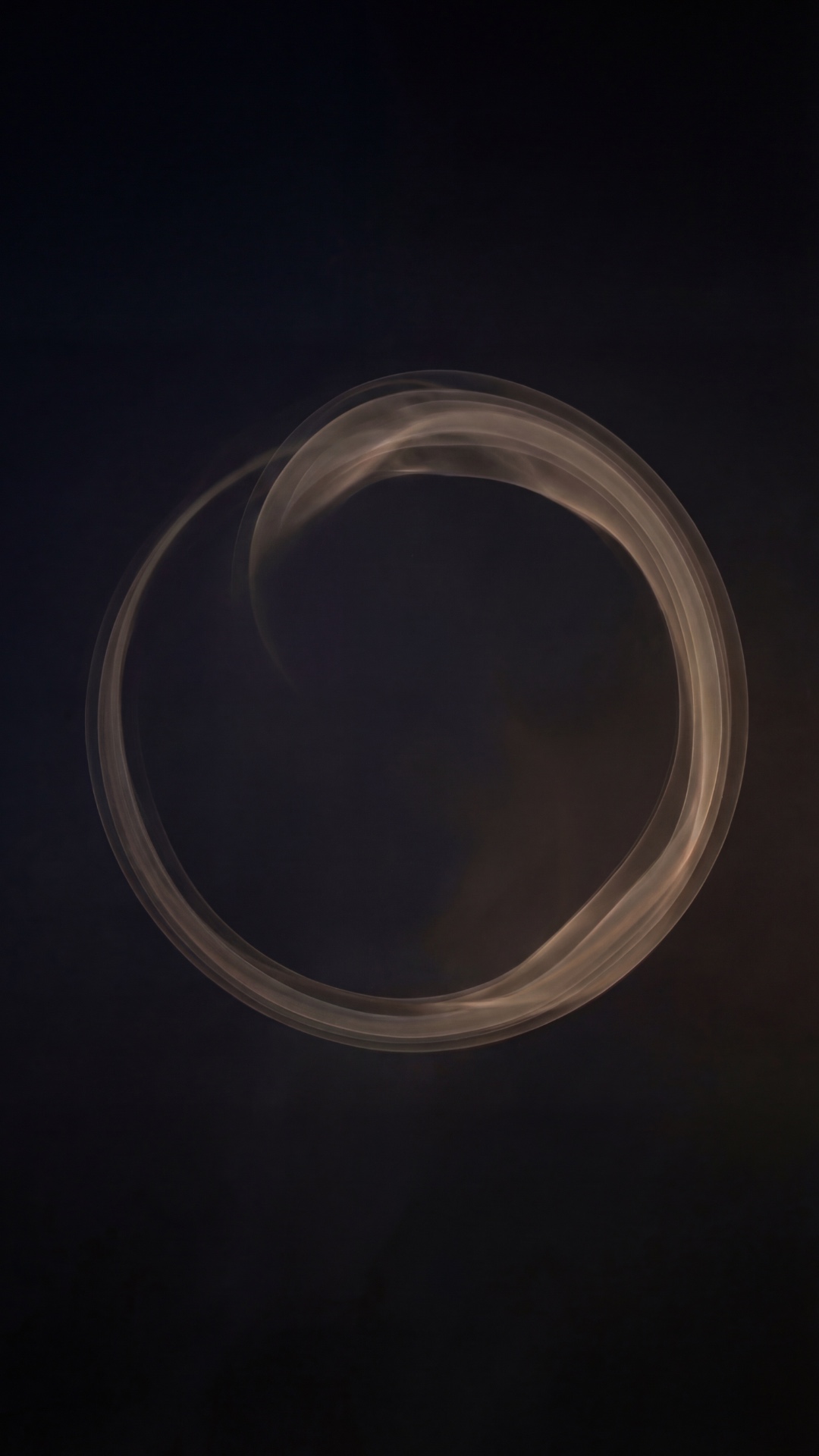 Almost completely still circular light form. 
Only imperceptible changes in glow intensity. 
Feel...