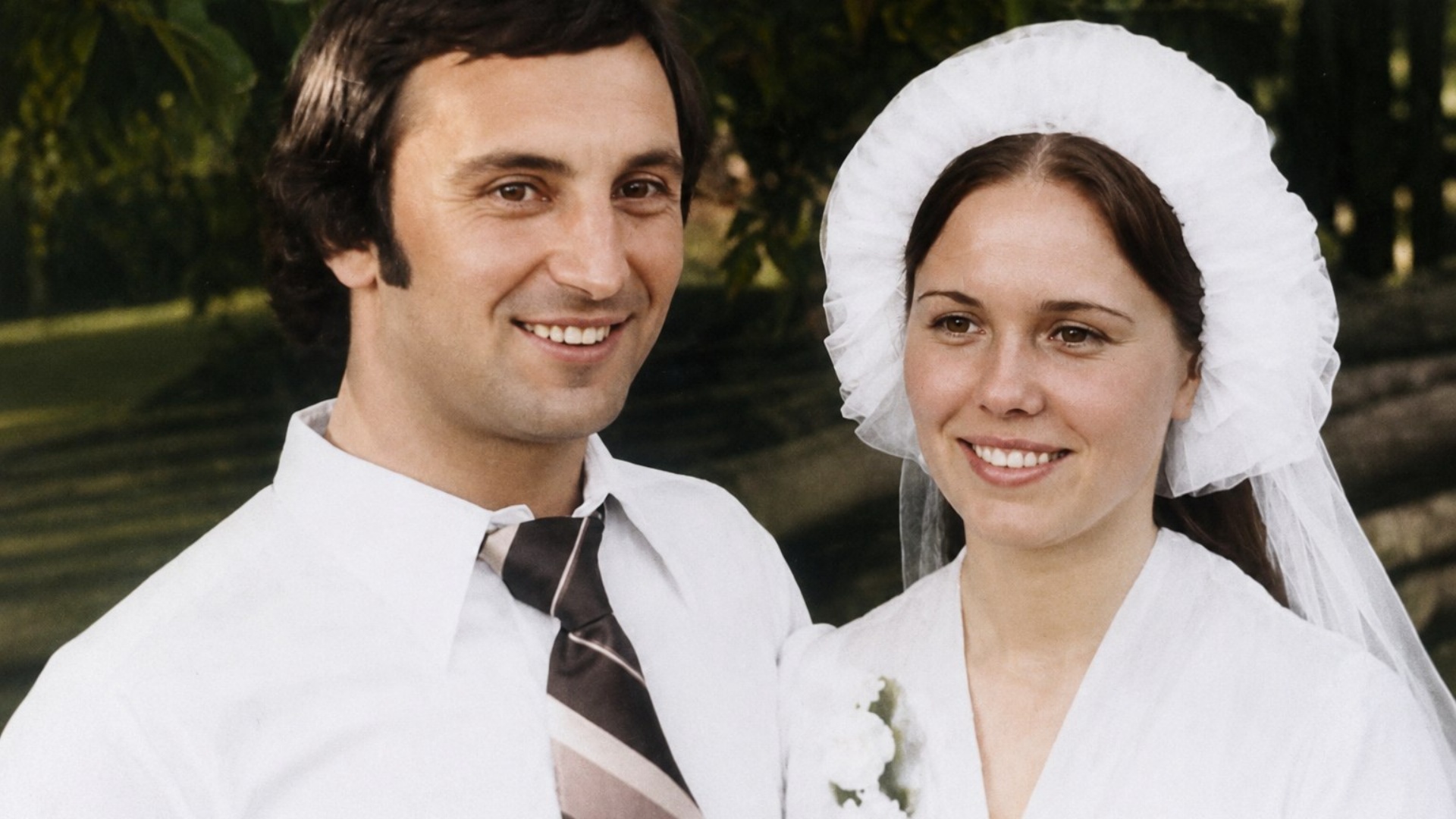Wedding photo comes gently to life. The bride and groom slowly turn their heads to each other. Th...