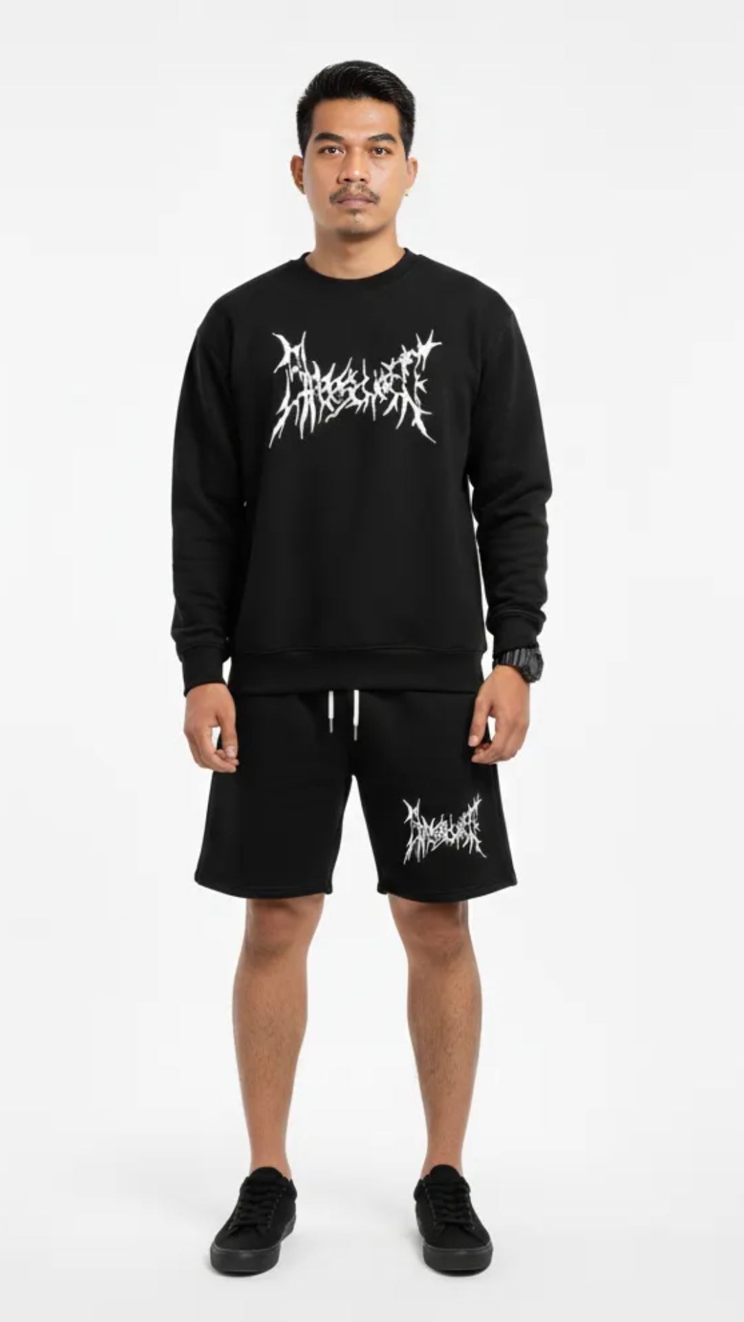 6-second cinematic video of a teenage model wearing a black oversized sweatshirt and matching sho...