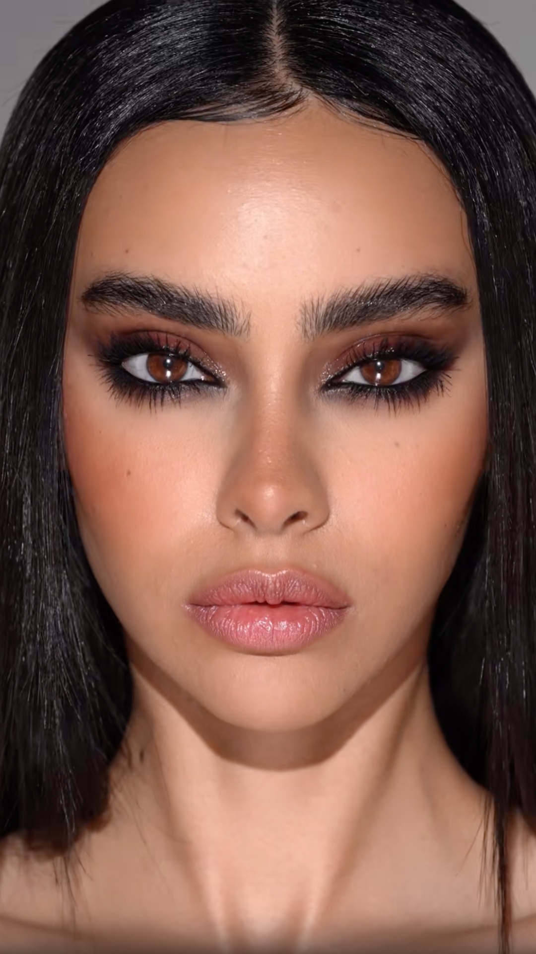 Girl demonstrating a makeup in a cinematic style