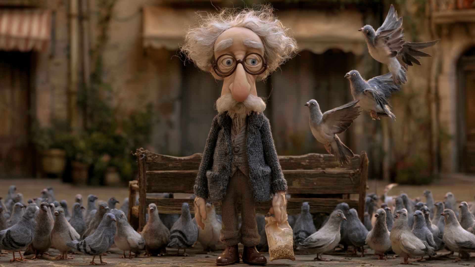 The pigeons already around the man become more active: several peck at the ground while the birds...
