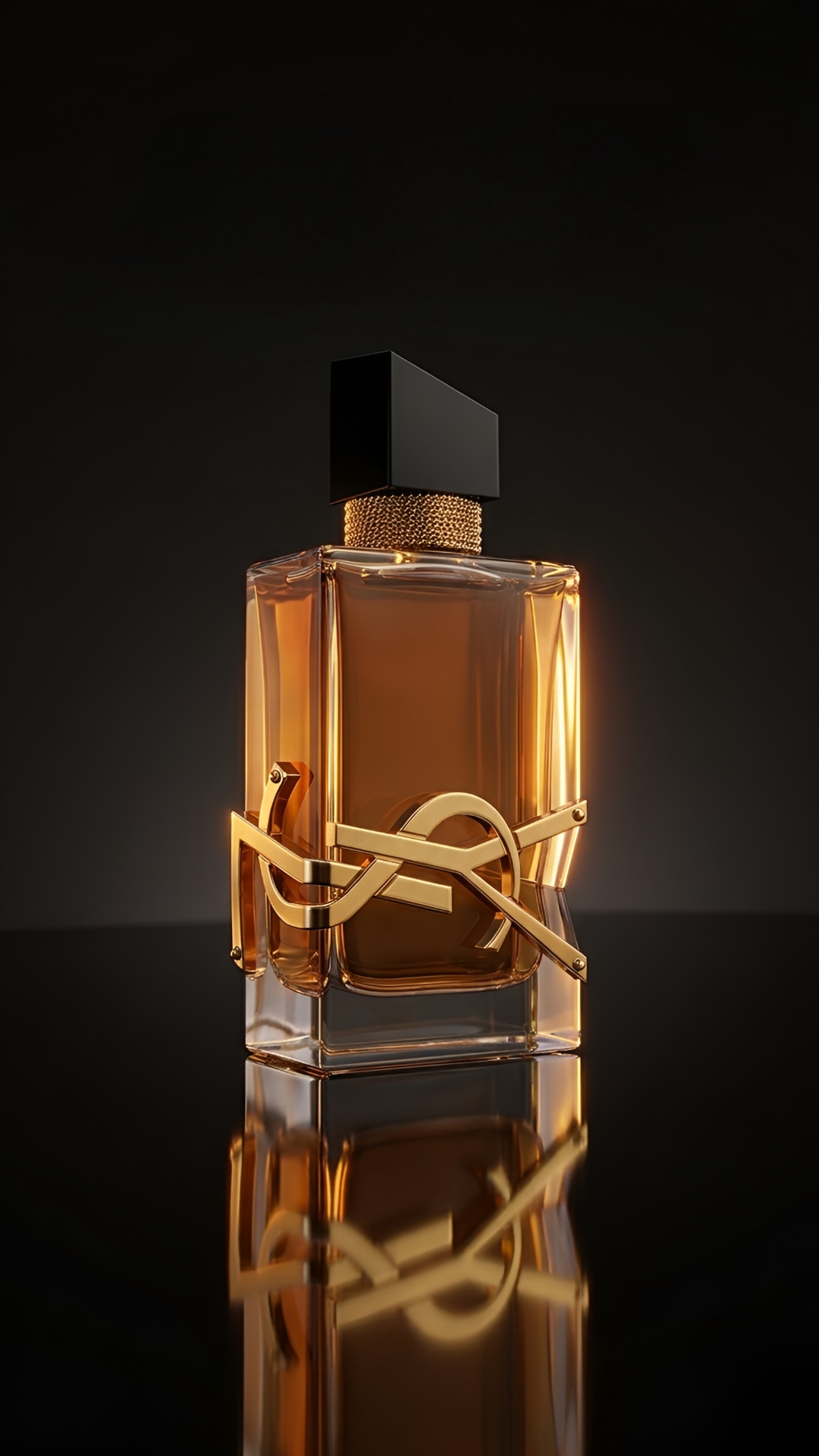 Starting with a macro shot of the gold YSL logo on the glass, the camera gradually zooms out and ...