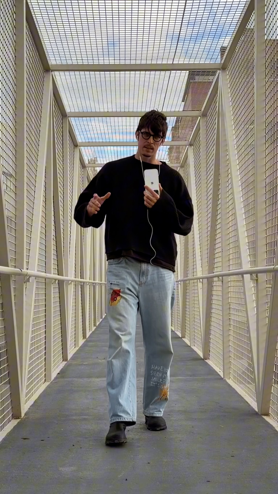 Static locked camera shot. The person remains completely still in the exact same pose, with no bo...