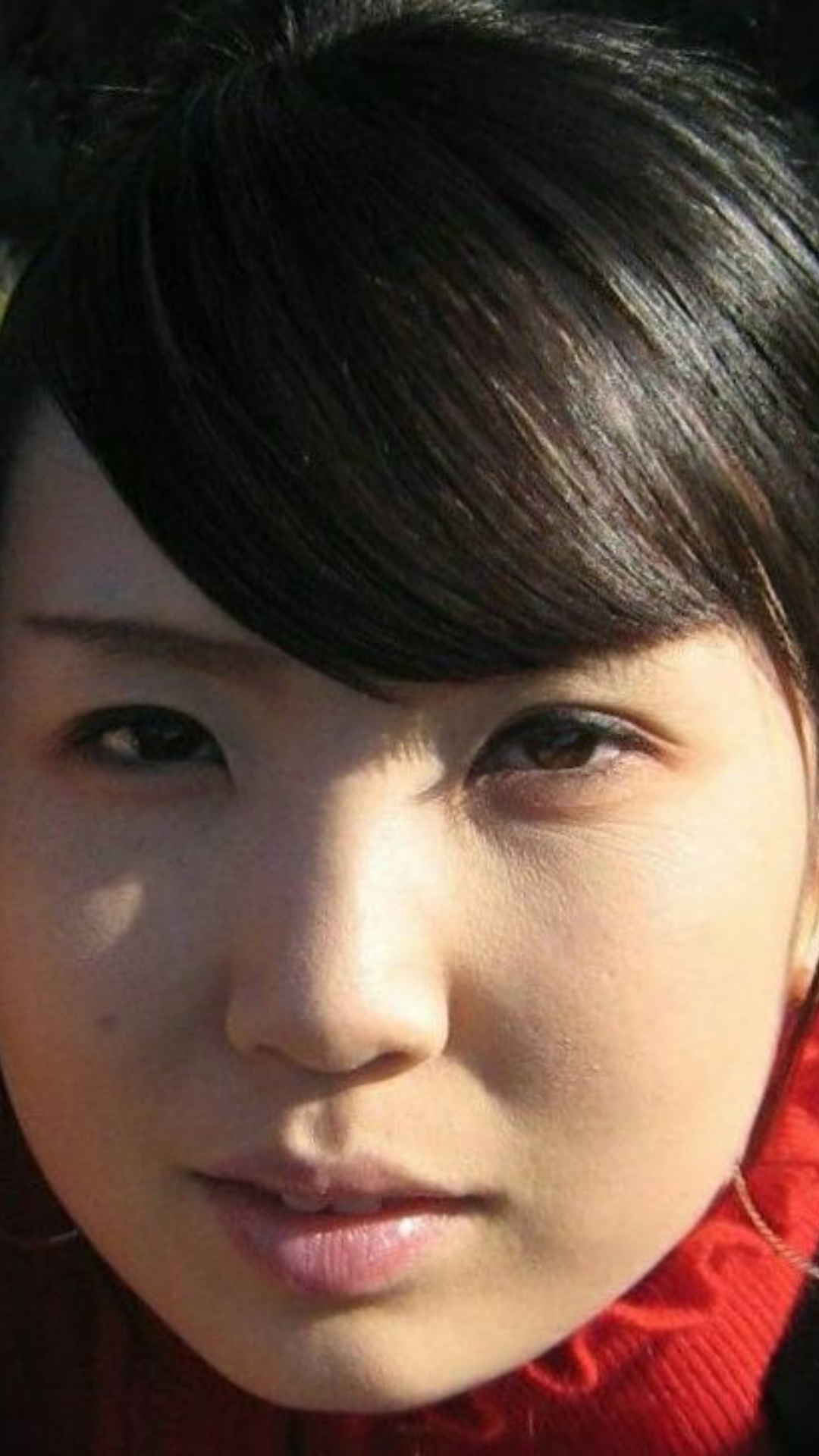She is Korean. She is sigh. And she saying very slowly Korean language.
"빨리, 빨리 해줘"