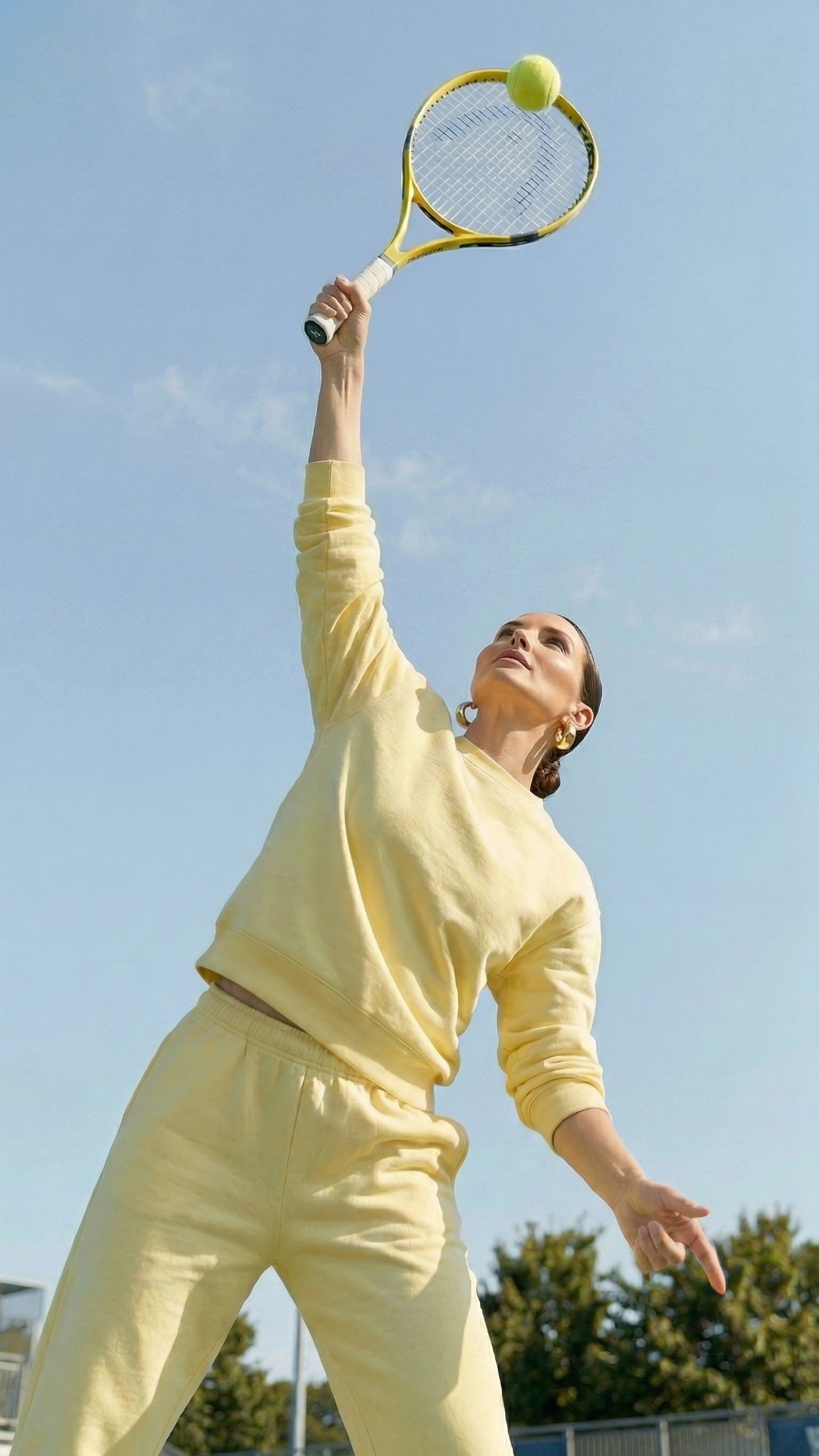 she is playing tennis