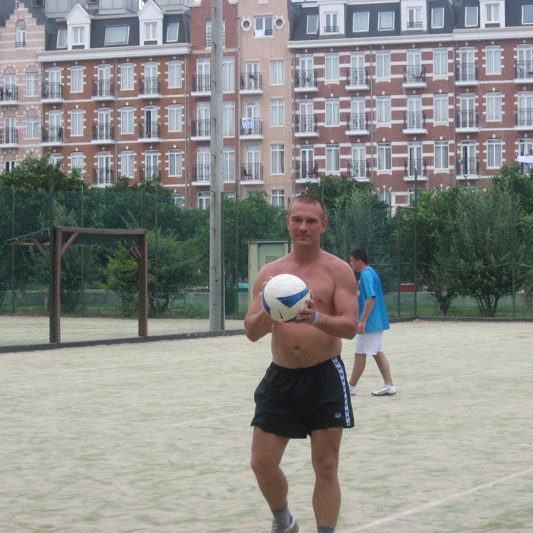 Hyper-realistic, male player keeps juggling the ball, smooth foot movements, authentic physics, s...