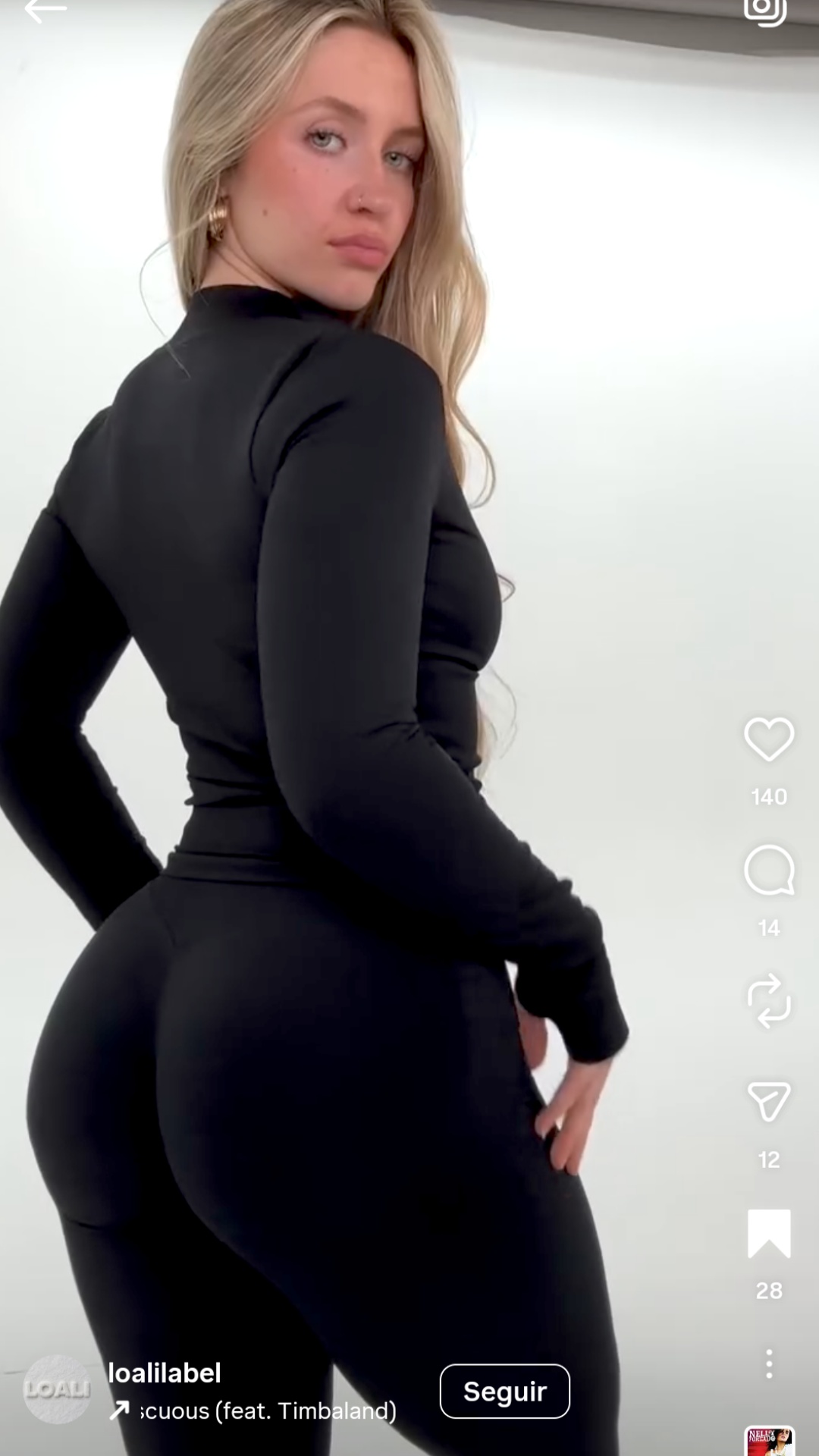 Another girl comes up to the right and lifts and Carry the Blonde woman