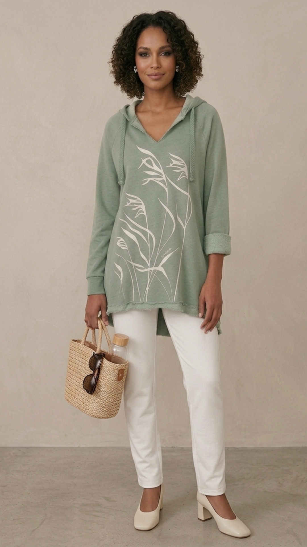 Have the model wave to a friend a far.  make the background be at an upscale ocean resort.