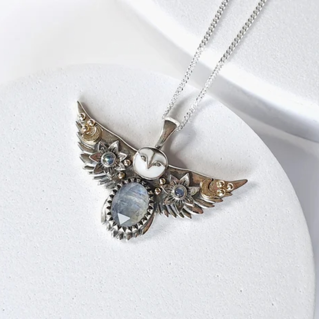 Cinematic product video of the reference jewelry piece. The background, colors, and lighting must...