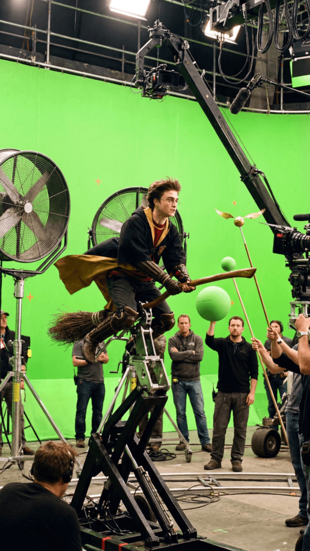 Behind the scenes filming: The hydraulic rig shakes and tilts, simulating flight movement. The la...