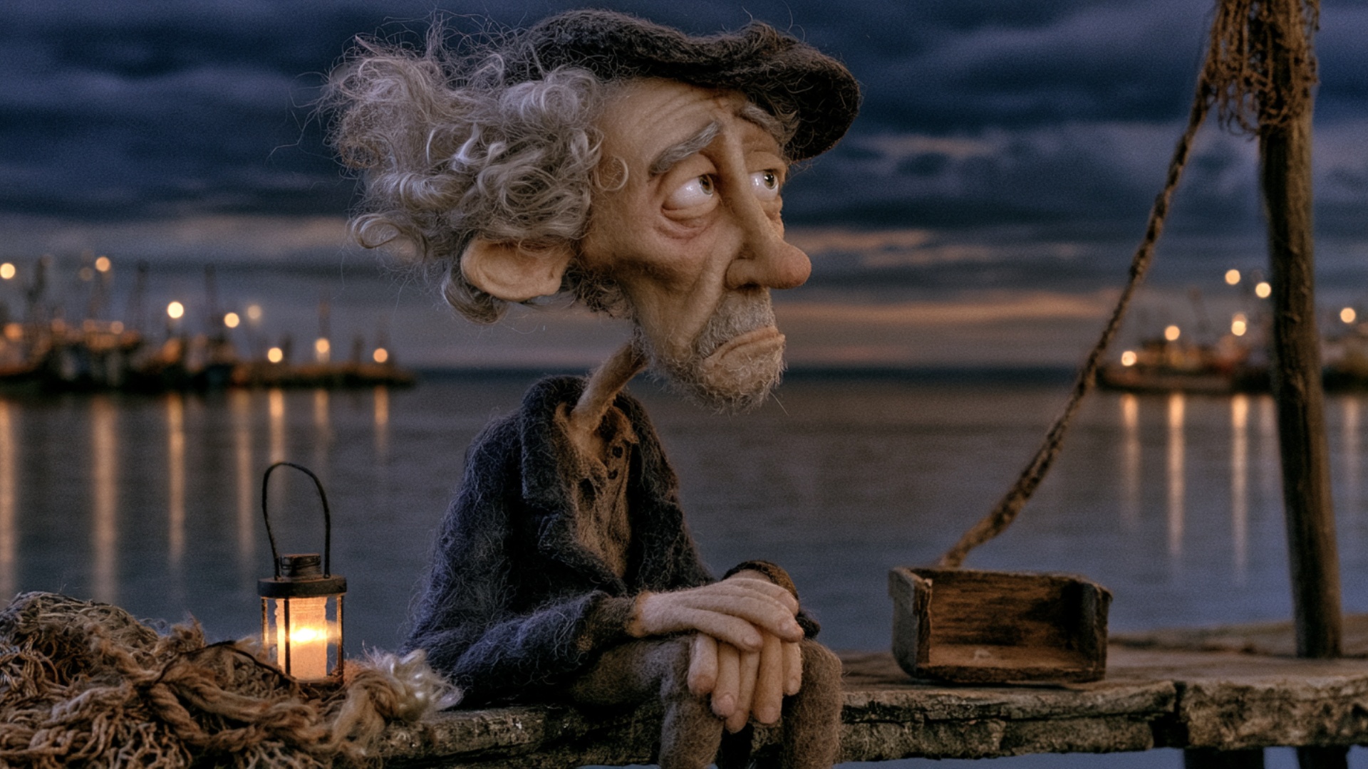 The man remains seated in the same relaxed pose, quietly watching the harbor. He slowly shifts hi...