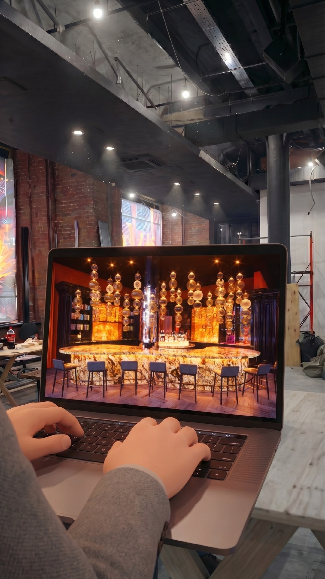 slow push-in to laptop screen showing warm beautiful interior design, screen glowing softly, refl...