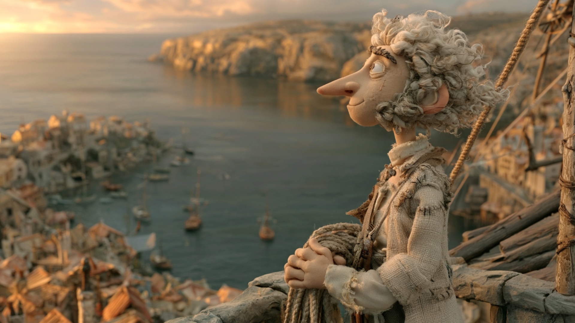 Gradual cinematic pull-back revealing more of the harbor. The man keeps the coil of rope held in ...