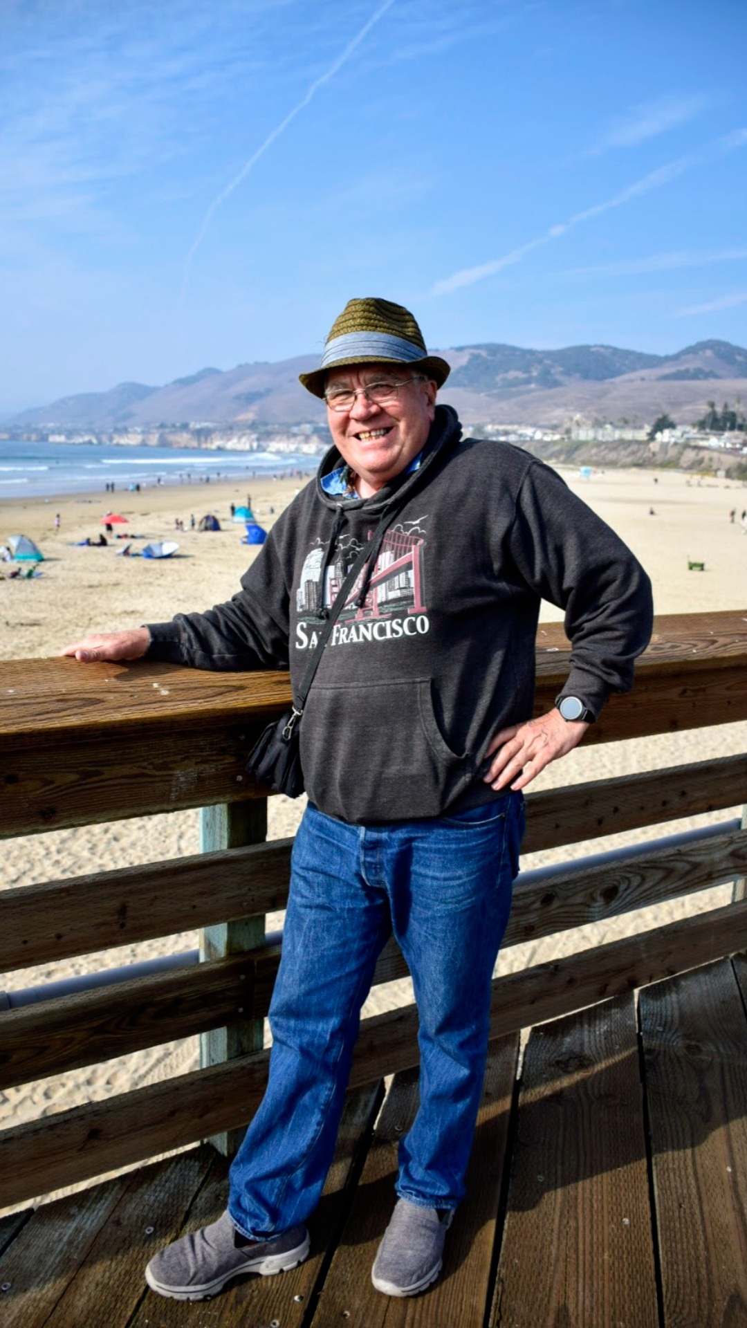 Make the man turn to look at the ocean