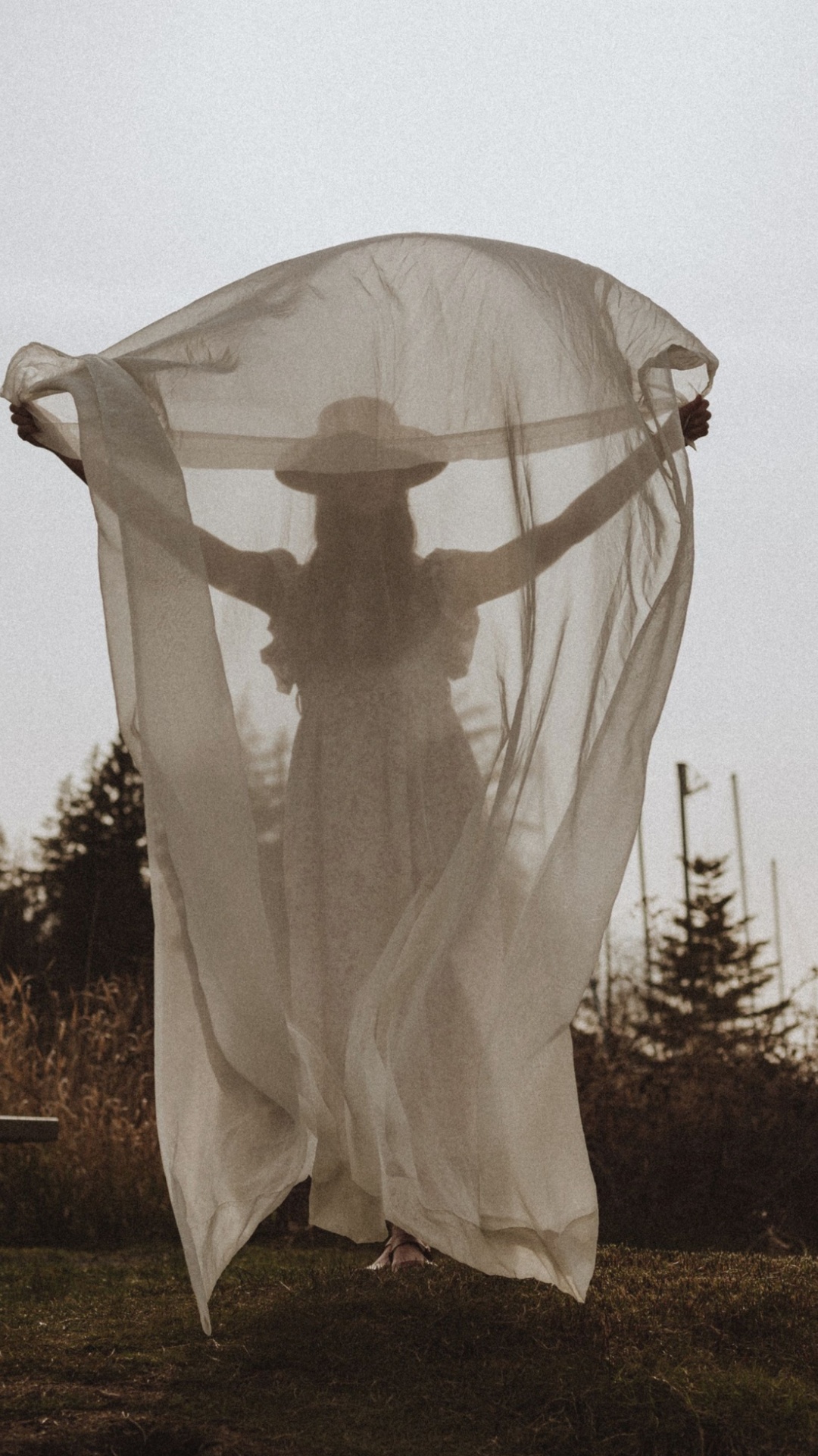 make her sheer cloth billow in wind as she slowly turns around. latina plese